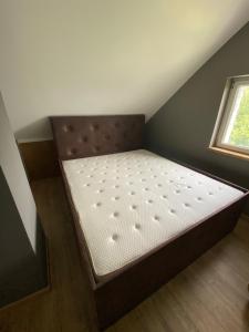 Postel nebo postele na pokoji v ubytování Le doux refuge
