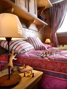 Кровать или кровати в номере CGH Résidences & Spas Le Nevada