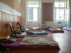 Cama o camas de una habitación en Budget Hostel
