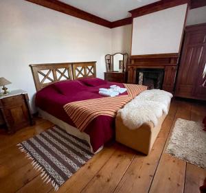 Tempat tidur dalam kamar di Estancia Monte Dinero