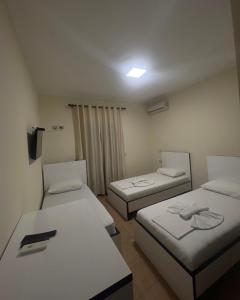 Cama o camas de una habitación en Hotel Silvio