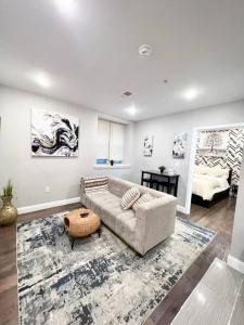 a living room with a couch and a table at 305 Cozy and lovely 1BDR apartment in Center City in Philadelphia