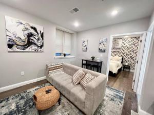 a living room with a couch and a table at 305 Cozy and lovely 1BDR apartment in Center City in Philadelphia