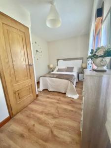 Łóżko lub łóżka w pokoju w obiekcie Casa las Hiedras