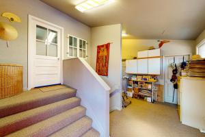 a room with a staircase with a white door and a stair case at Elati Guesthouse in Denver