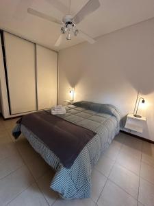 Katil atau katil-katil dalam bilik di Departamento Quinta N