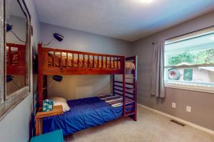 Krevet ili kreveti na kat u jedinici u objektu HomeSted Retreat