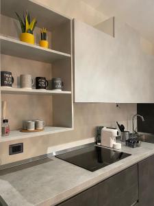 a kitchen with a sink and a counter at Dimora 7 fontane in Paola