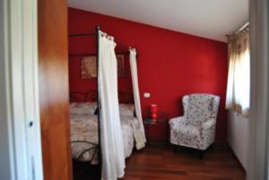 Uma cama ou camas num quarto em Villa Casarza