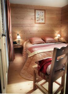 Katil atau katil-katil dalam bilik di CGH Résidences & Spas La Ferme Du Val Claret