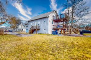 a large white house with a large yard at Reach for the Beach in Onset