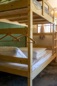 Llit o llits en una habitació de 彎腰拾光旅人空間Good Old Times