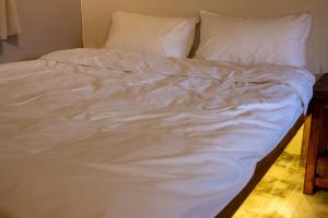 Llit o llits en una habitació de 彎腰拾光旅人空間Good Old Times