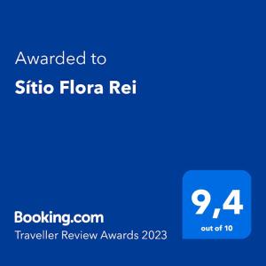 Um certificado, prêmio, placa ou outro documento exibido em Sítio Flora Rei