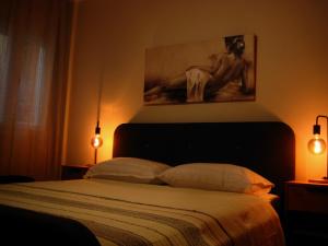 Katil atau katil-katil dalam bilik di Alkion Apartment