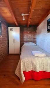 a bedroom with a bed in a room at Departamento completo in Ciudad Lujan de Cuyo