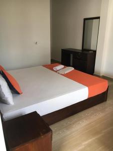 Postel nebo postele na pokoji v ubytování Athena Guest House