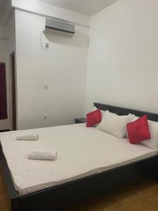 Letto o letti in una camera di Athena Guest House