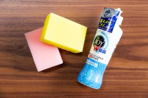 a stick of toothpaste next to a sponge and a toothbrush at Meteor Shower in Sapporo