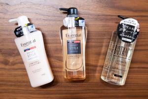 three bottles of hair products sitting on a wooden table at Meteor Shower in Sapporo