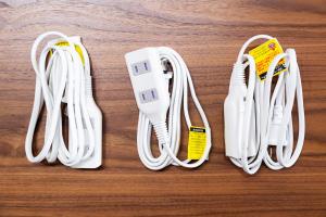 a group of white controllers on a wooden table at Meteor Shower in Sapporo