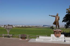 a statue of a man with his arms out at Meteor Shower in Sapporo