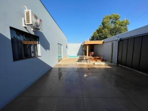Cantinho Estrelado - Casa automatizada com ALEXA的阳台或露台