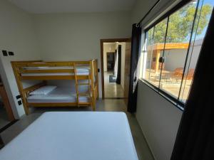 Cantinho Estrelado - Casa automatizada com ALEXA客房内的一张或多张床位