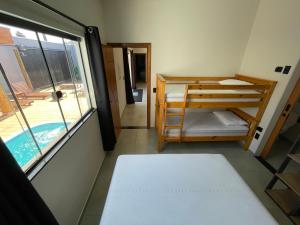 Cantinho Estrelado - Casa automatizada com ALEXA客房内的一张或多张床位