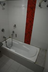 Un baño de Olive Zip Rest House Road by Embassy Group