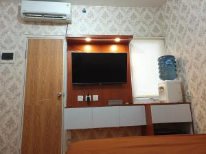 TV a/nebo společenská místnost v ubytování Bolang Apartel