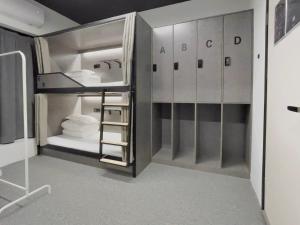 Tempat tidur susun dalam kamar di Sifang Space Hostel Xi'an - Xi'an TIYUCHANG metro station Line2