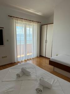 Posteľ alebo postele v izbe v ubytovaní Apartment Vesela 2