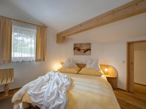 Posteľ alebo postele v izbe v ubytovaní Landhaus Manzl