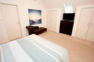 Apt 9 'Delphinius' @ Bay View Centro, Dunsborough客房内的一张或多张床位