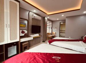 Postel nebo postele na pokoji v ubytování En Hotel Sapa