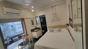 Letto o letti in una camera di Hotel Kemps Corner