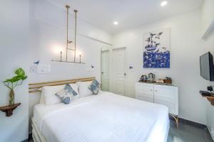 Letto o letti in una camera di Hotel Kemps Corner
