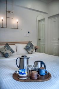 Letto o letti in una camera di Hotel Kemps Corner