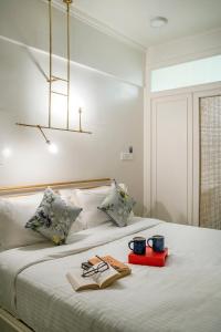 Letto o letti in una camera di Hotel Kemps Corner