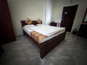 Postelja oz. postelje v sobi nastanitve N Joy Inn
