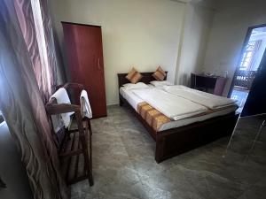 Postelja oz. postelje v sobi nastanitve N Joy Inn