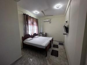 Postelja oz. postelje v sobi nastanitve N Joy Inn