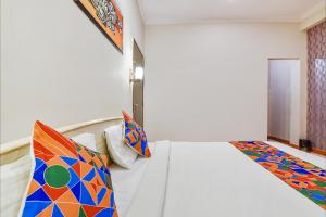 Krevet ili kreveti u jedinici u objektu FabHotel Shri Laxmi Palace