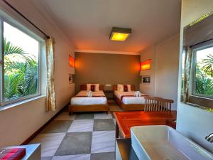 Postel nebo postele na pokoji v ubytování Villa Um Theara, Siem Reap