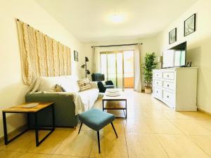 A television and/or entertainment centre at Rooftop Pool Apartment Corralejo