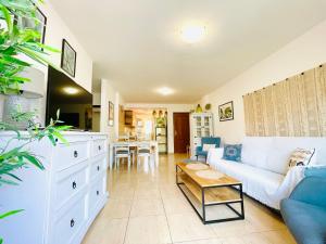 A kitchen or kitchenette at Rooftop Pool Apartment Corralejo