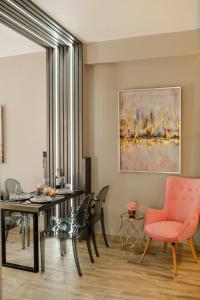a dining room with a table and chairs at PELAGIO APARTMENT 1 in Alexandroupoli