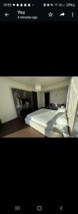 Cama ou camas em um quarto em Address residence by emmar