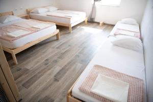 Postel nebo postele na pokoji v ubytování Duplex Apartma Nikolina